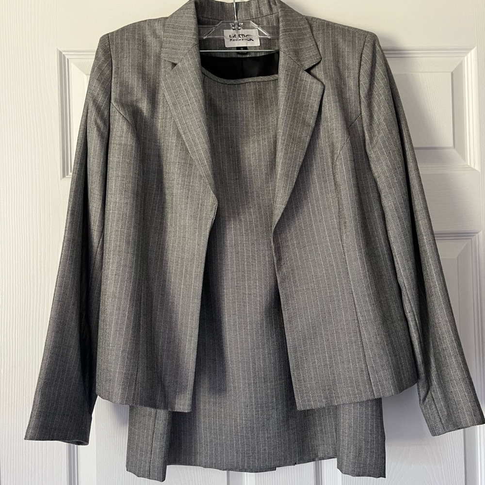 Suit with jacket and skirt, size 12.